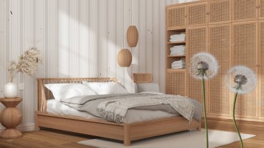 Tohum sporlarını ahşap ve rattan yatak odası, çizgili duvar kağıdı, yatak ve dekorlar üzerine üfleyerek kabarık havadar karahindiba. İç tasarım fikri. Değişim, büyüme, hareket ve özgürlük kavramı