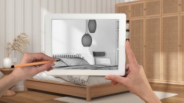 Tablete el ele tutuşup resim çiziyoruz. Modern ahşap yatak odası detaylarını gösteriyoruz. Arka planda gerçekten bitmiş iç mimari tasarım sunumu