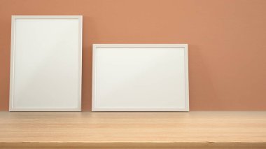 Çerçeve ahşap masaya, masaya ya da rafa yapıştır. Fotokopi alanı olan turuncu alçı duvar arkaplanı, iç tasarım şablonu