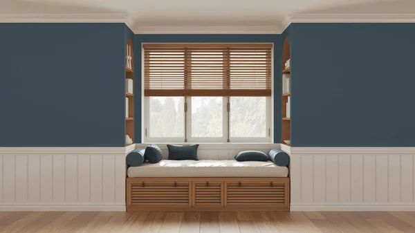 Classic window with siting bench and pillows. Wooden venetian blinds, bookshelf and decors. Blue walls with copy space for text. Modern interior design