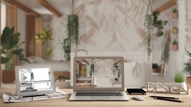 Architect designer desktop concept, laptop and tablet on wooden desk with screen showing interior design project and CAD sketch, blurred draft in the background, bathroom and bedroom