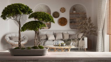 Çakıl taşı ve saksı çiçeği olan klasik ahşap masa rafı, yeşil çiçekler, bohem ahşap oturma odası bohem tarzı, zen temiz mimari konsepti fikri.