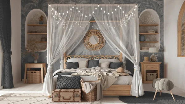 Bohemian bedroom with canopy bed in white and gray tones. Parquet, natural wallpaper and ethnic carpets. Rattan and wooden furniture. Boho style interior design