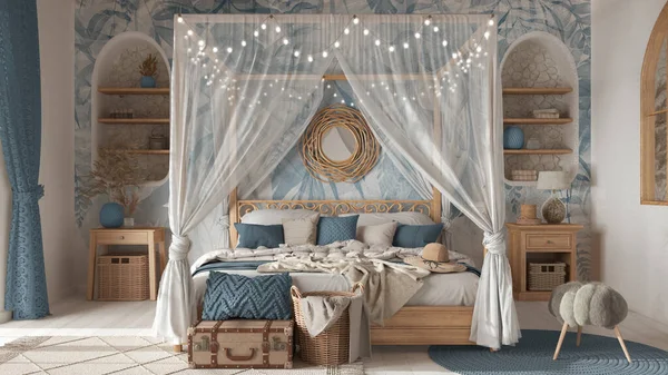 Bohemian bedroom with canopy bed in white and blue tones. Parquet, natural wallpaper and ethnic carpets. Rattan and wooden furniture. Boho style interior design