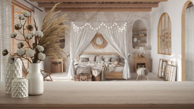 Ahşap masa, masa ya da raf seramik vazolarla kaplansın bohem yatak odasının üzerinde pamuk çiçekler, bohem yatak, bohem tarzı iç tasarım konsepti