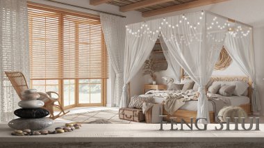 Çakıl taşı dengeli ahşap masa rafı ve 3 boyutlu harflerle bohem ahşap yatak odasının üzerinde bohem yataklı feng shui sözcüğü, zen kavramlı iç tasarım.