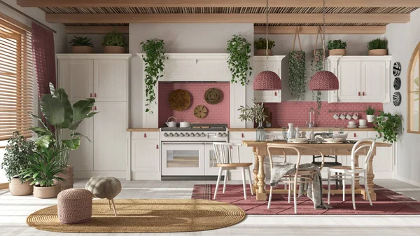 Wooden country kitchen in white and red tones.Dining table, carpet and appliances. Scandinavian boho interior design
