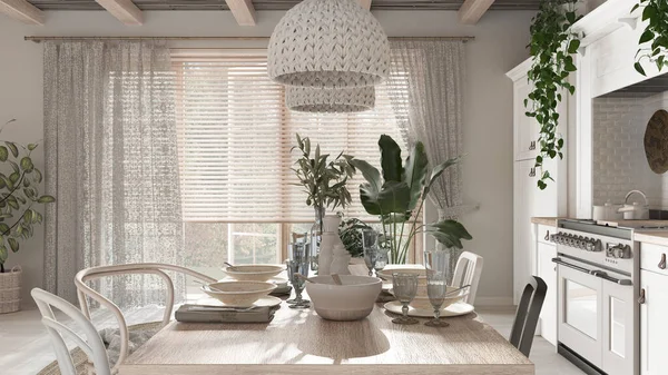 Wooden country dining table setting in white and bleached wood tones. Kitchen, pendant lamps and window. Scandinavian boho interior design