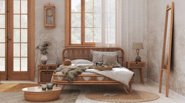 Boho chic farmhouse bedroom with double bed and rattan furniture. Jute carpet and decors in white and beige tones. Country wallpaper, bohemian interior design