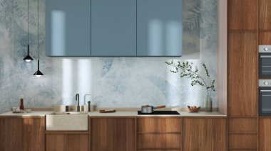 Japandi trendy wooden kitchen in white and blue tones. Wooden cabinets, contemporary wallpaper and marble top. Minimalist interior design