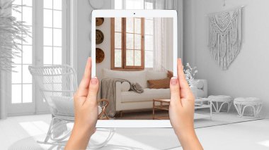 El ele tutuşma tableti oturma odasını boho tarzında gösteriyor, tamamen boş proje geçmişi, artırılmış gerçeklik konsepti, mobilya ve iç tasarım ürünlerini taklit etmek için uygulama