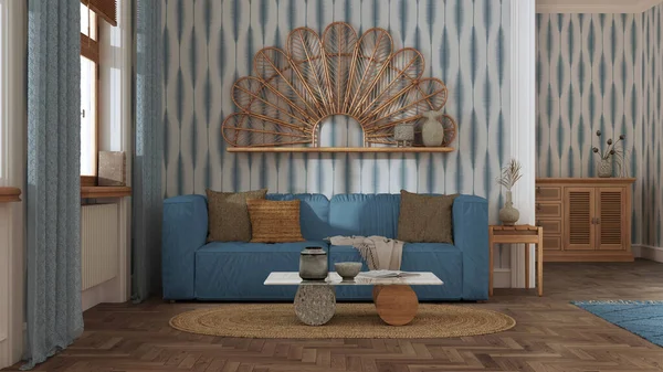Farmhouse wooden living room with wallpaper and herringbone parquet in blue and beige tones. Sofa, jute carpet and decors. Boho style interior design