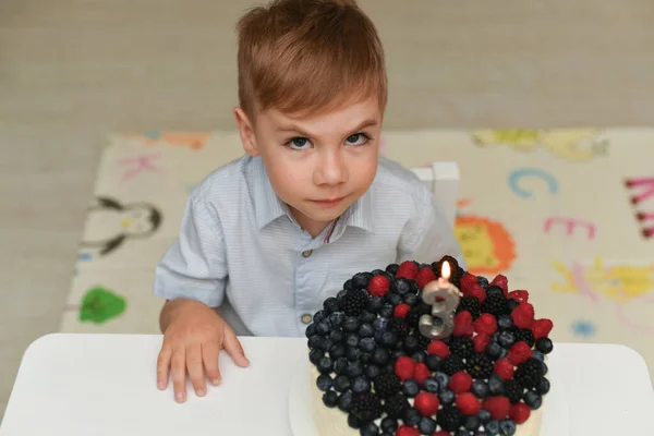 Boy Blows Out Candles His Birthday — Stock Photo, Image