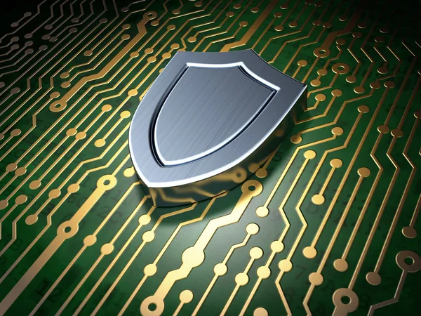 Security concept: circuit board with shield icon — Stock Photo, Image