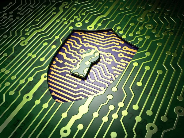 Security concept: circuit board with shield with keyhole icon — Stock Photo, Image