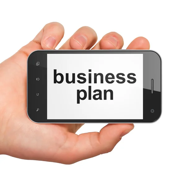 Hand holding smartphone with word business plan on display. Gene — Stock Photo, Image