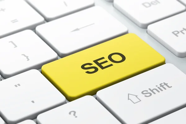 Desarrollo Web Concepto SEO: teclado de ordenador con SEO —  Fotos de Stock