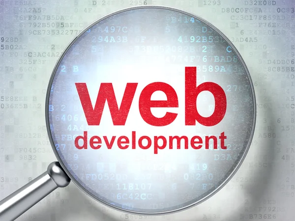 Développement web SEO concept : verre optique avec des mots Web Develo — Photo