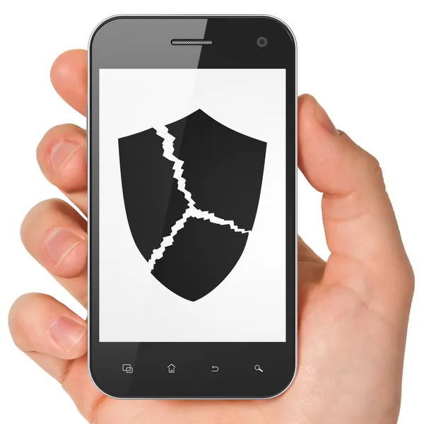 Концепция безопасности: Сломанный щит на смартфоне — стоковое фото