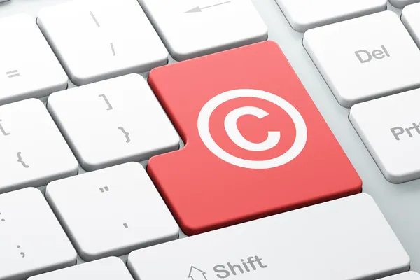 Concept de droit : Droit d'auteur sur fond de clavier d'ordinateur — Photo