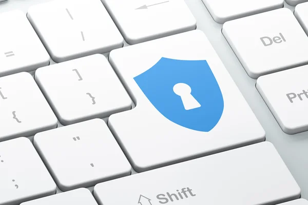 Safety concept: Shield With Keyhole on computer keyboard backgro – stockfoto