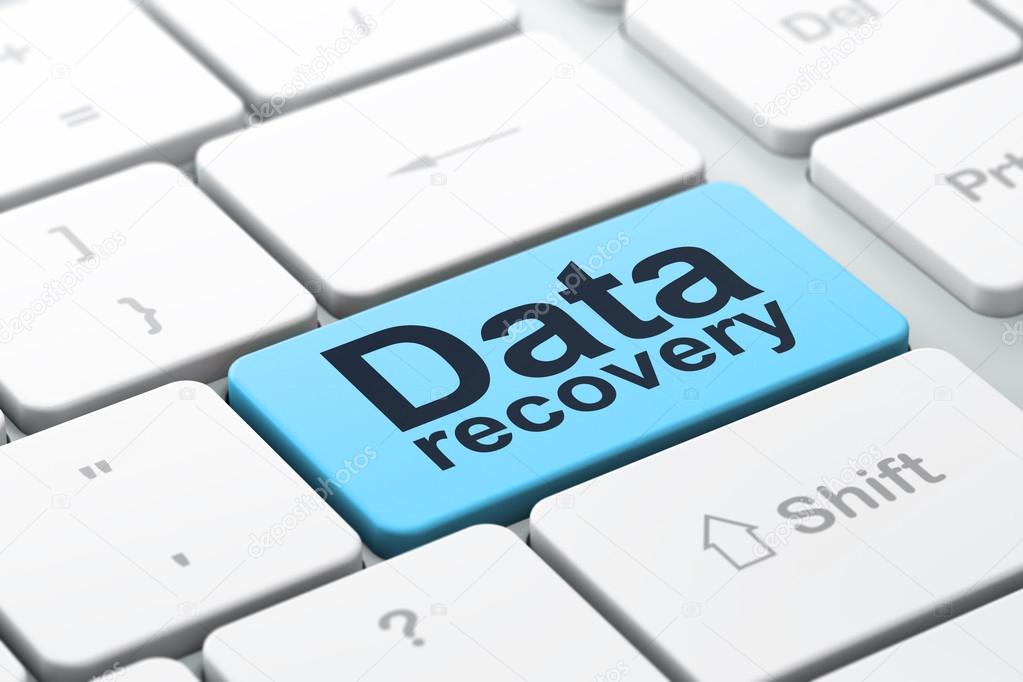Information concept: Data Recovery on computer keyboard backgrou
