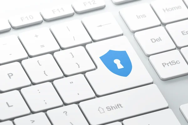 Security concept: Shield With Keyhole on computer keyboard backg — Stock Photo, Image