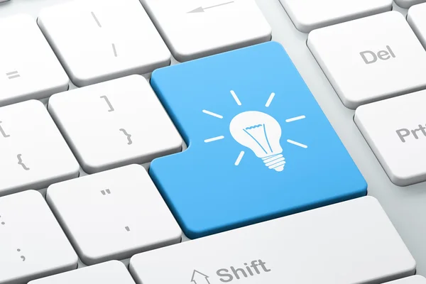 Business concept: Light Bulb on computer keyboard background — Stock Photo, Image