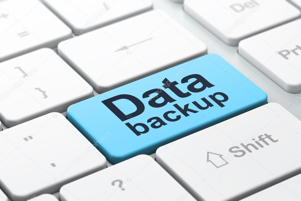 Information concept Data Backup on computer keyboard background Stock