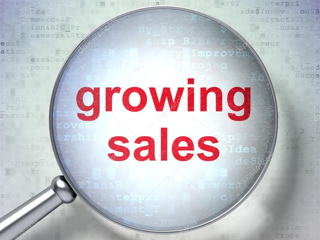 Finance concept: Growing Sales with optical glass