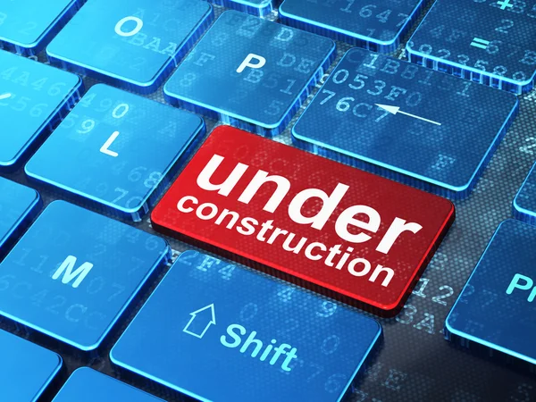 Web ontwikkelingsconcept: Under Construction op computertoetsenbord — Stockfoto
