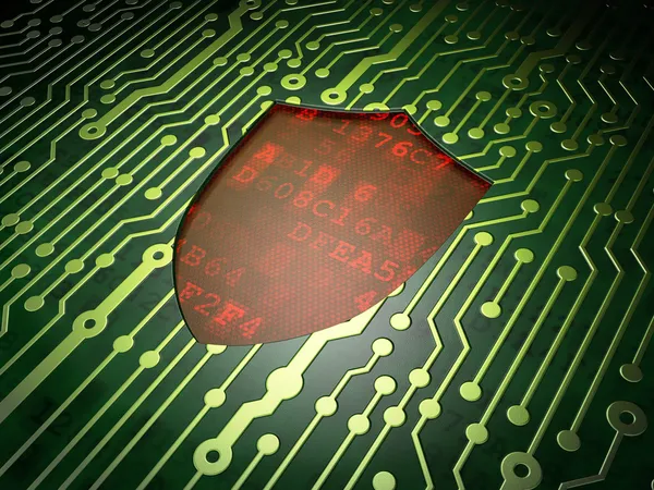Security concept: Shield on circuit board background — Stock Photo, Image