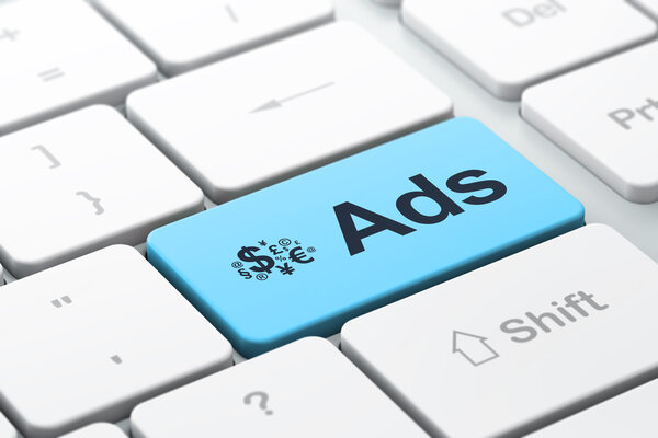 Advertising concept: Finance Symbol and Ads on computer keyboard