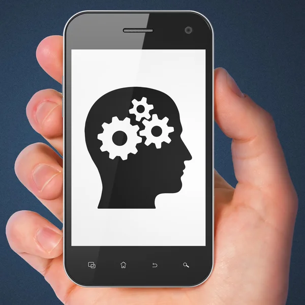 Advertising concept: Head With Gears on smartphone — Stock Photo, Image