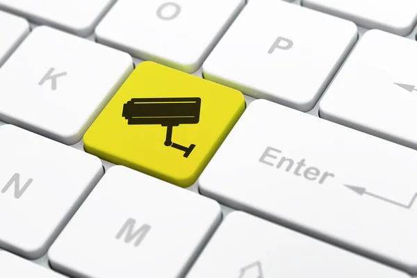 Safety concept: Cctv Camera on computer keyboard background — Stock Photo, Image