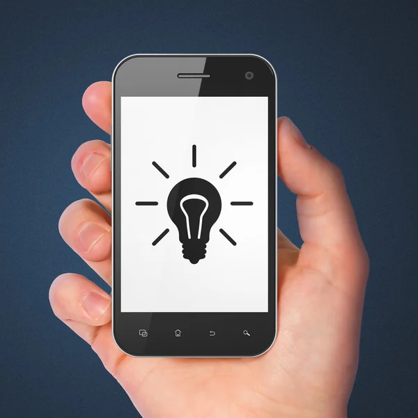 Business concept: Light Bulb on smartphone — Stock Photo, Image