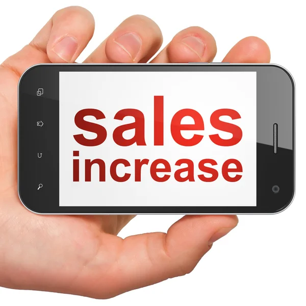Маркетинговая концепция: увеличение продаж на смартфоне — стоковое фото