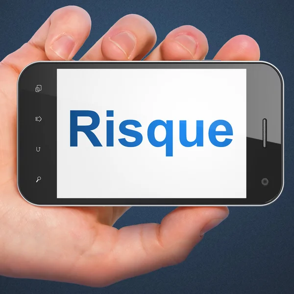 财务理念: 在智能手机上的 Risque(french) — 图库照片