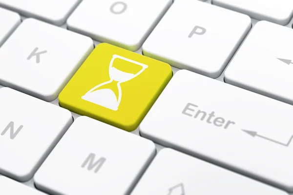 Timeline concept: Hourglass on computer keyboard background — Stock Photo, Image
