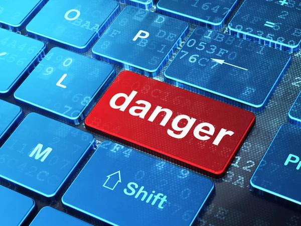 Концепция безопасности: Опасность на фоне клавиатуры компьютера — стоковое фото