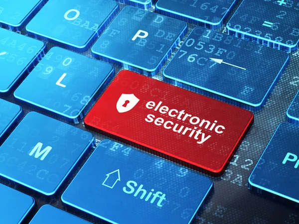 Концепції безпеки: щит з замкову щілину і електронного захисту на фоні клавіатура комп'ютера — стокове фото