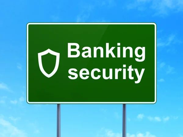 Conceito de proteção: Banking Security and Contoured Shield on road sign background — Fotografia de Stock