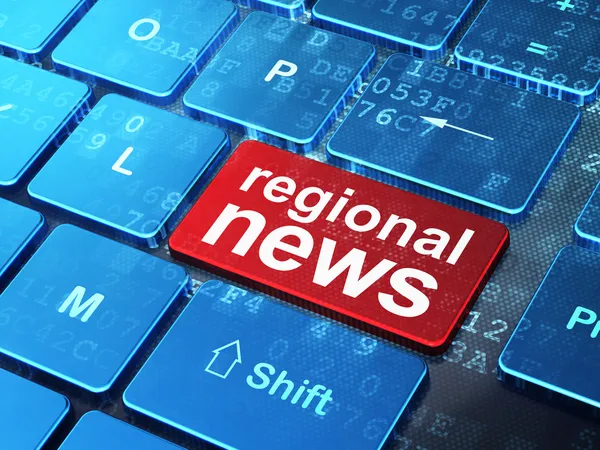 Концепция новостей: региональные новости на фоне клавиатуры компьютера — стоковое фото