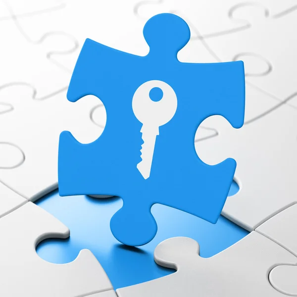 Security concept: Key on puzzle background — Stock Photo, Image
