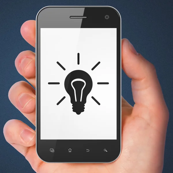 Business concept: Lampadina su smartphone — Foto Stock