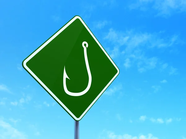 Protection concept: Fishing Hook on road sign background — Stock Photo, Image