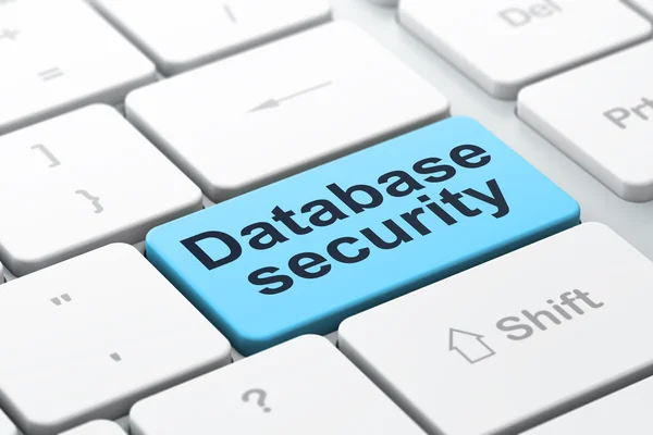 Bescherming concept: database beveiliging op computer toetsenbord achtergrond — Stockfoto