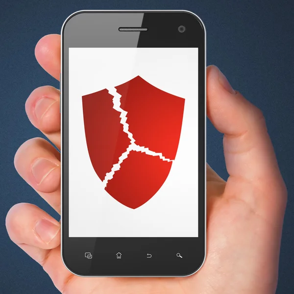 Security concept: Broken Shield on smartphone — Stock Photo, Image