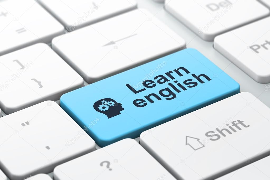Education concept: Head With Gears and Learn English on computer keyboard background
