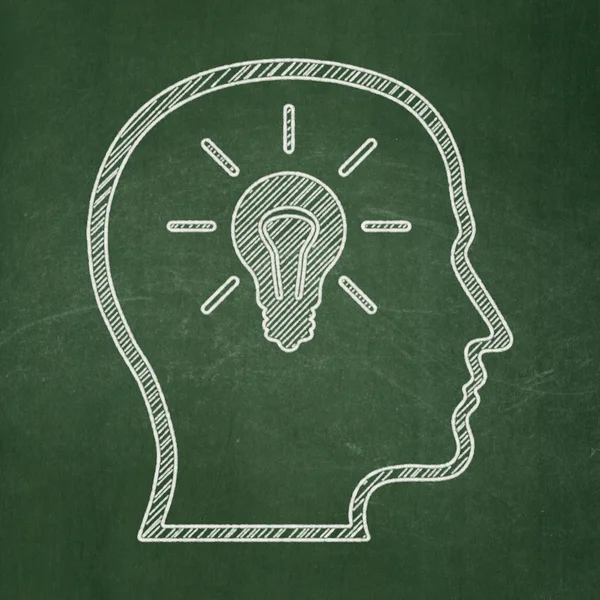 Marketing concept: Head With Lightbulb on chalkboard background — Stock Photo, Image
